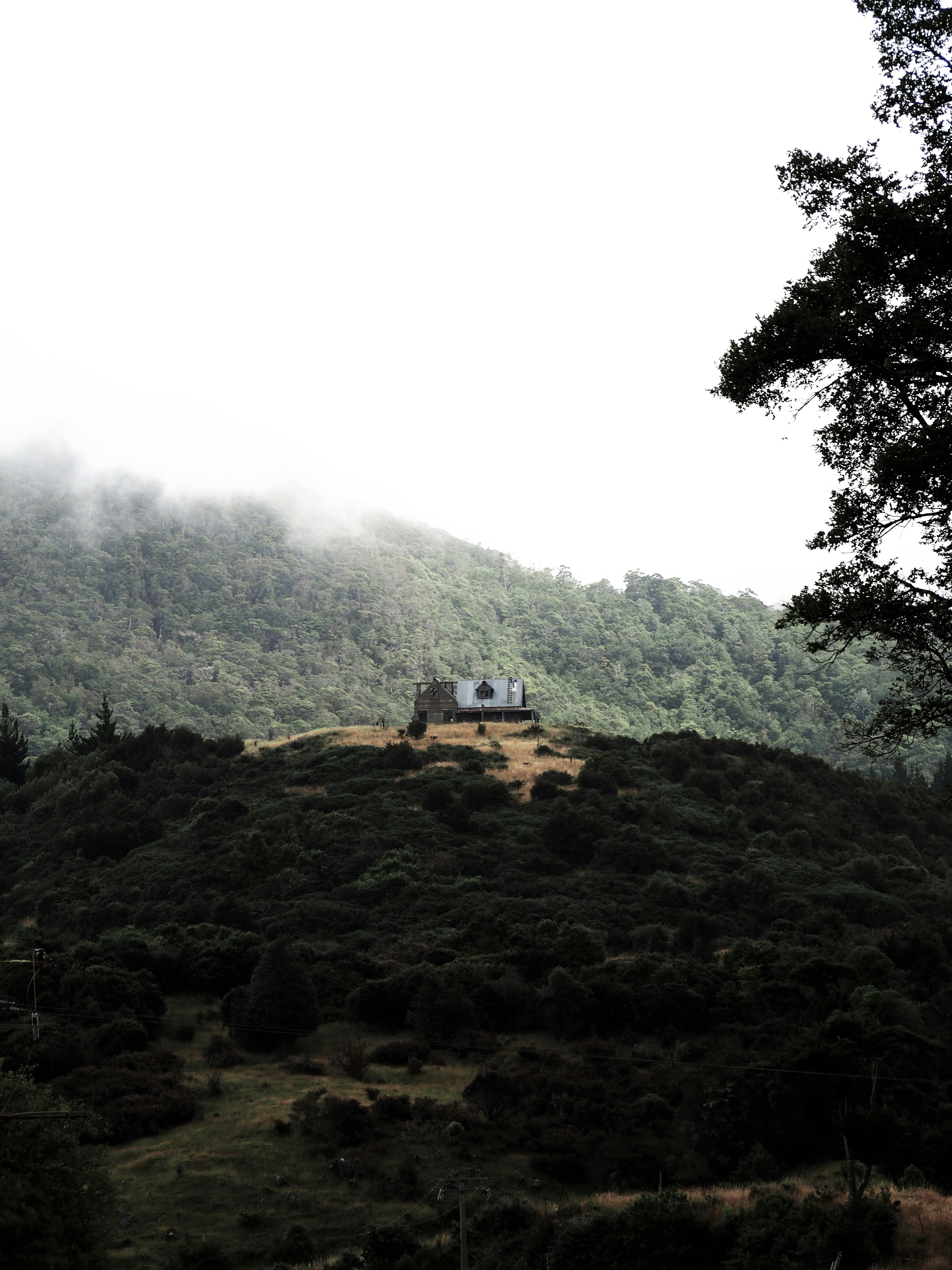 concrete house in a mountain during daytime